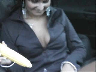 Ear of corn in pierced pussy in car