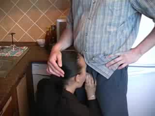 Horny milf in business clothes boned in kitchen